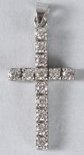 AN 18CT GOLD AND DIAMOND CROSS PENDANT.