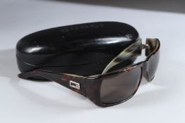 A PAIR OF GUCCI SUNGLASSES in a folding case. GU.1494/55U259a11115.