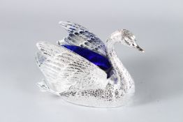 A GOOD HEAVY PLATED SWAN with blue glass liner. 20cms high.