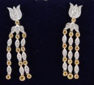 A PAIR OF WHITE AND YELLOW 18CT GOLD DROP EARRINGS.