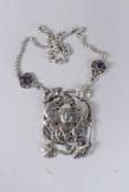 AN ART NOUVEAU SILVER PENDANT AND CHAIN.