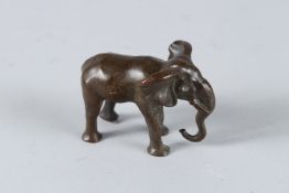 A BRONZE ELEPHANT. 7cms.