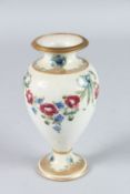 A SMALL MOORCROFT MACINTYRE VASE, Rose Garland design, Circa. 1900. Script signature. 14cms high.
