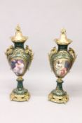 A VERY GOOD PAIR OF SEVRES STYLE GREEN GROUND PORCELAIN VASES with oval painted panels of figures