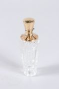 AN 18CT GOLD TOP SCENT BOTTLE. 3.5ins long.