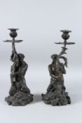 AFTER FRANCESCO FANELLI. A GOOD PAIR OF ANTIQUE BRONZE CANDLESTICKS designed in a figurative style