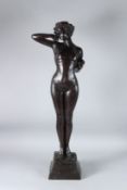 A GOOD ART NOUVEAU BRONZE STANDING NUDE on a square base. 80cms high.
