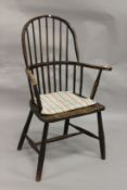 A COUNTRY MADE WINDSOR SPINDLE BACK ARMCHAIR.