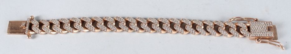 AN 9CT GOLD DIAMOND PANTHER BRACELET. 35 grams. Approx 6cts diamonfds.