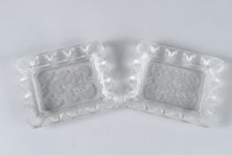 A PAIR OF LALIQUE RECTANGULAR DISHES. 12cms x 10cms. Engraved Lalique, France.