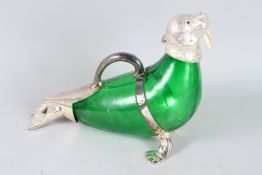 A LARGE AMBER GLASS AND PLATE WALRUS CLARET JUG.