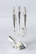 A SILVER PLATED FOUR-PIECE BAR TOOL SET.