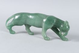 A GOOD RUSSIAN JADE TIGER with gold and diamond eyes. 25cms high.