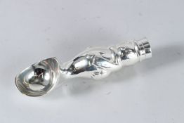 A PLATED ICE CREAM SCOOP.