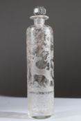 A 19TH CENTURY SCENT BOTTLE engraved with a deer hunting scene. 19cms high.