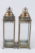 A PAIR OF METAL SQUARE LANTERNS. 21ins high.