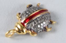 A DIAMOND SET LADYBIRD PENDANT.