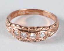 A VICTORIAN 9CT ROSE GOLD DIAMOND RING.