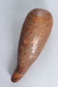A RARE CARVED NUT. 45cms high.