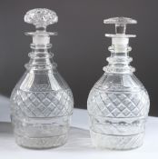 TWO GOOD REGENCY HOBNAIL CUT DECANTERS AND STOPPERS. 24cms high.