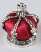 A FABERGE SILVER CROWN PINCUSHION.