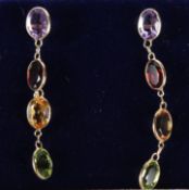 A PAIR OF 18CT GOLD GEM SET DROP EARRINGS.