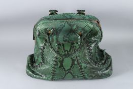 A ROBERTO CAVALLI SNAKESKIN BAG. 40cms wide.
