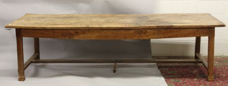 A LARGE CONTINENTAL SIX PLANK TOP COUNTRY MADE TABLE. 285cms long x 97cms wide x 80cms high.