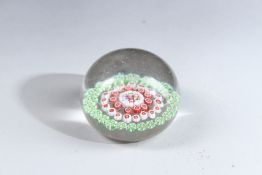 A MILLEFIORI PAPERWEIGHT. 6cms diameter.