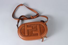 A FENDI LEATHER BAG with long leather strap. 20cms wide, in a Fendi dust cover and box.