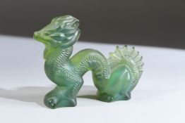 A SMALL LALIQUE AMBER CRYSTAL DRAGON, CIRCA. 1945. Etched Lalique, France. 9cms high.