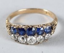 AN 18CT GOLD, DIAMOND AND SAPPHIRE DOUBLE-ROW RING.
