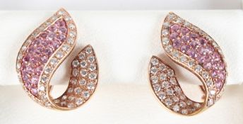 A PAIR OF 18CT GOLD, PINK SAPPHIRE AND DIAMOND WING SHAPED EARRINGS.