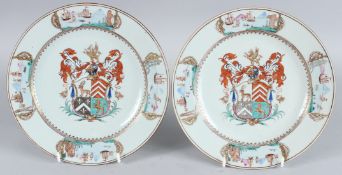 A SUPERB PAIR OF CHINESE EXPORT ARMORIAL PLATES. 9ins diameter. Circa 1740.
