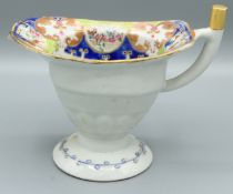 A GOOD CHINESE EXPORT PORCELAIN MILK JUG, CIRCA 1785. 4ins high. Painted with a plain body and