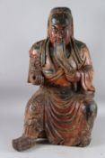 A LARGE CHINESE CARVED WOOD STATUE OF GUAN YU, also known as GUAN DI, a Chinese general from The