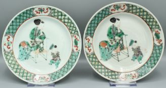 A SUPERB PAIR OF CHINESE KANG HSI CIRCULAR PLATES. Mother and Child. Provenance: Oriart, Stockholm.