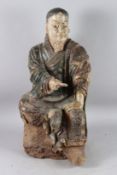A GOOD STATUE OF LUOHAN, a follower of BUDDHA, a seated figure with an individually naturalistic