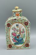 A GOOD CHINESE CANTON STYLE FLORAL TEA CANISTER AND COVER, CIRCA 1710 - 1770. 5.5ins high. Painted