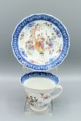 A VERY GOOD CHINESE EXPORT PORCELAIN TEACUP AND SAUCER, CIRCA 1736 - 1750. With blue border, the