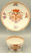 A SUPERB CHINESE EXPORT PORCELAIN TEA BOWL AND SAUCER, CIRCA 1736 - 1750. With gilt border, the