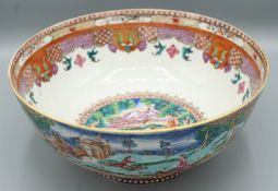 A SUPERB CHINESE PUNCH BOWL, CIRCA 1736 - 1795. 10ins diameter. Painted with European hunting