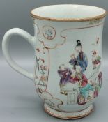 A GOOD CHINESE SHAPED PORCELAIN TANKARD. 6.5ins high. Painted with long figures. Circa 1740.