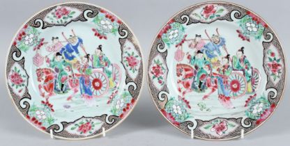 A PAIR OF CHINESE FAMILLE ROSE CIRCULAR PLATES. The centre with Chinese figures, horse, figures