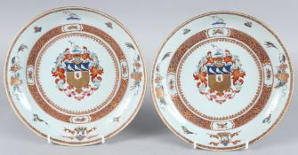 A GOOD PAIR OF CHINESE ARMORIAL PLATES. 8.5ins diameter. Circa 1740.