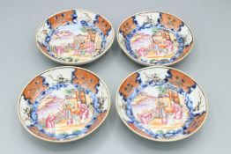 A GOOD SET OF FOUR CHINESE MANDARIN SAUCERS, CIRCA 1736 - 1765. 4.5ins high. Each with four
