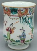 A GOOD CHINESE SHAPED PORCELAIN TANKARD. 6.25ins high. Painted with figures beneath trees. Circa