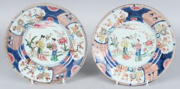 A GOOD PAIR OF CHINESE EXPORT PLATES. 8.5ins diameter. Famille Rose with two figures. Circa 1740.