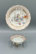A VERY GOOD CHINESE EXPORT PORCELAIN TEA BOWL AND SAUCER, CIRCA 1736, The centre with five figures