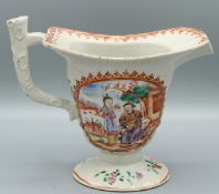 A GOOD CHINESE EXPORT PORCELAIN MILK JUG, CIRCA 1770. 5ins high. Painted with reverse panels of